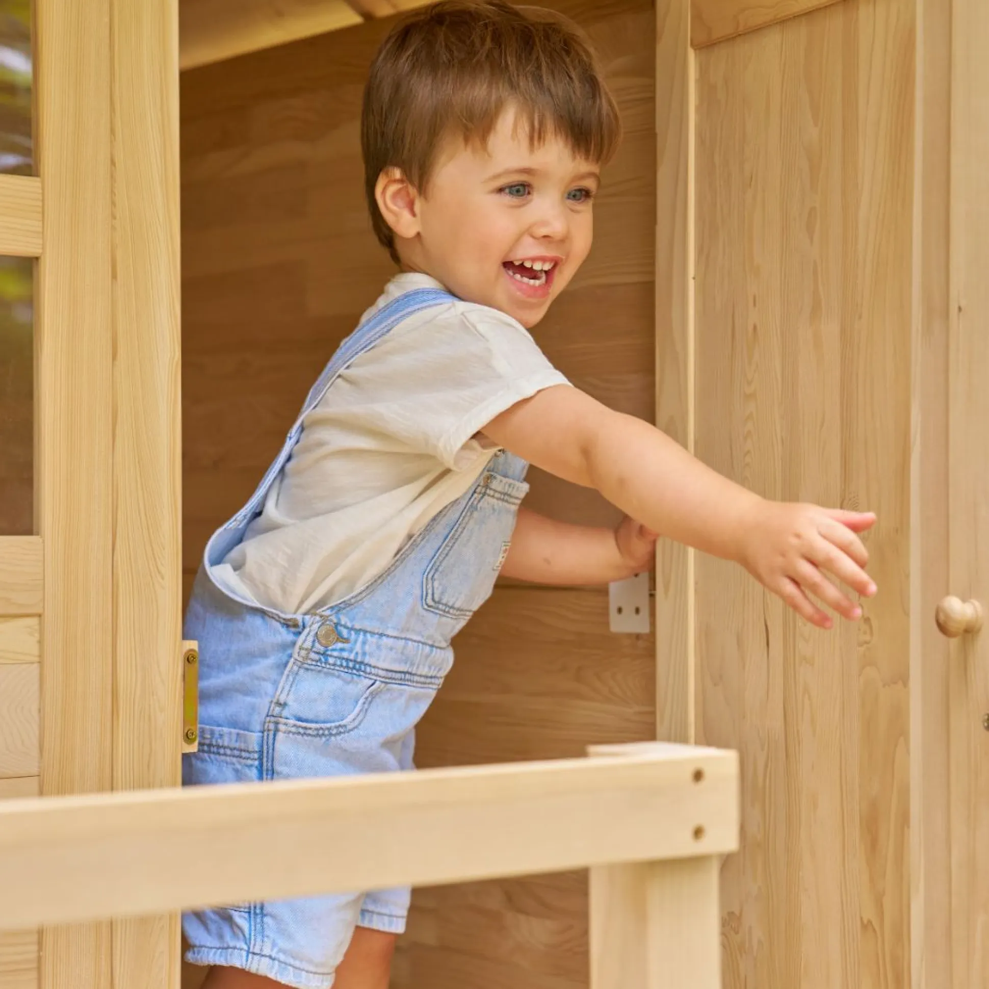 Buttercup Cottage Wooden Playhouse with Verandah, 6ft Wavy Slide, Swing Arm and Deck - FSC® certified
