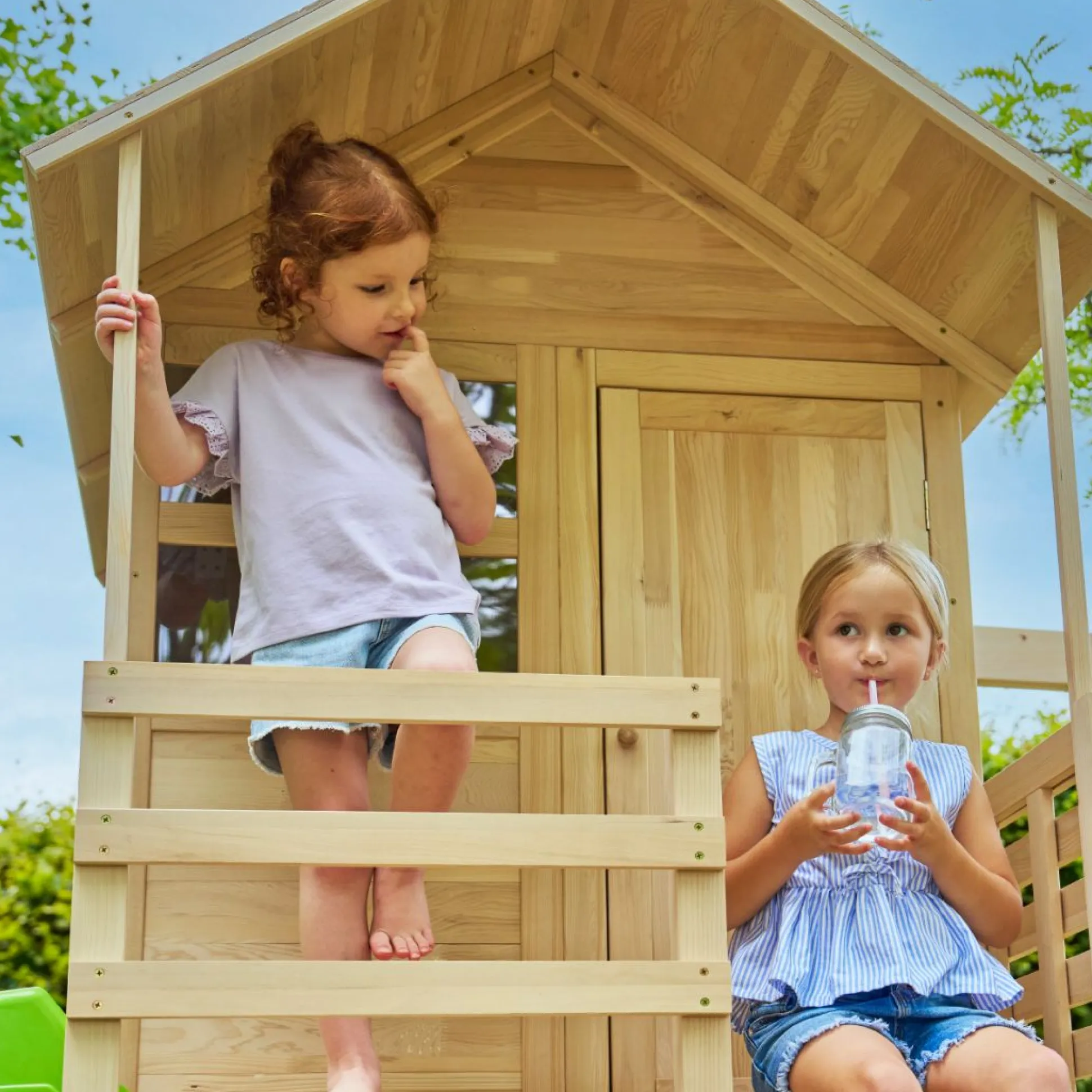 Buttercup Cottage Wooden Playhouse with Verandah, 6ft Wavy Slide, Double Swing Arm and Deck - FSC® certified