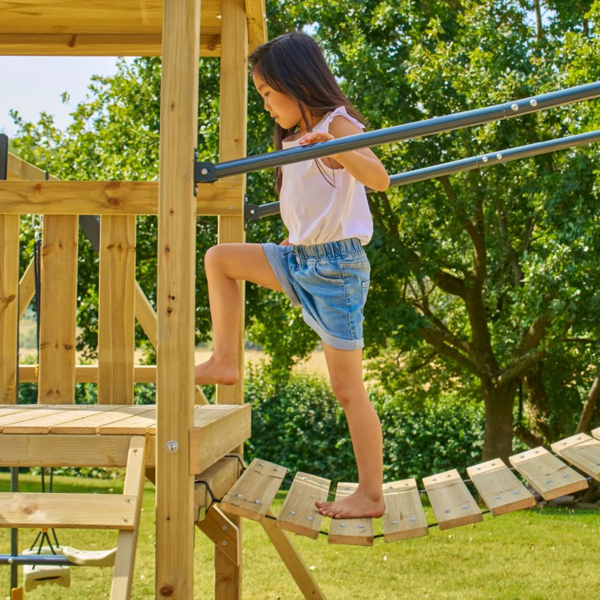 TP Skywood Wooden Tower Climbing Frame with Super Wavy Slide, Sky Deck, Monkey Bars, Skyline with Swing Seat & extra play tower - FSC® certified